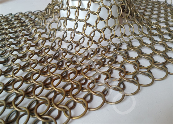 Zaprojektuj i wyprodukuj zasłonę z metalowej siatki ze stali nierdzewnej o wymiarach 1,2x10 mm